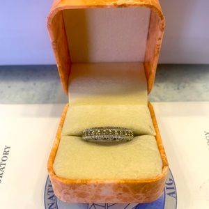 14k white gold channel set fancy yellow diamond ring.  1.11tcw